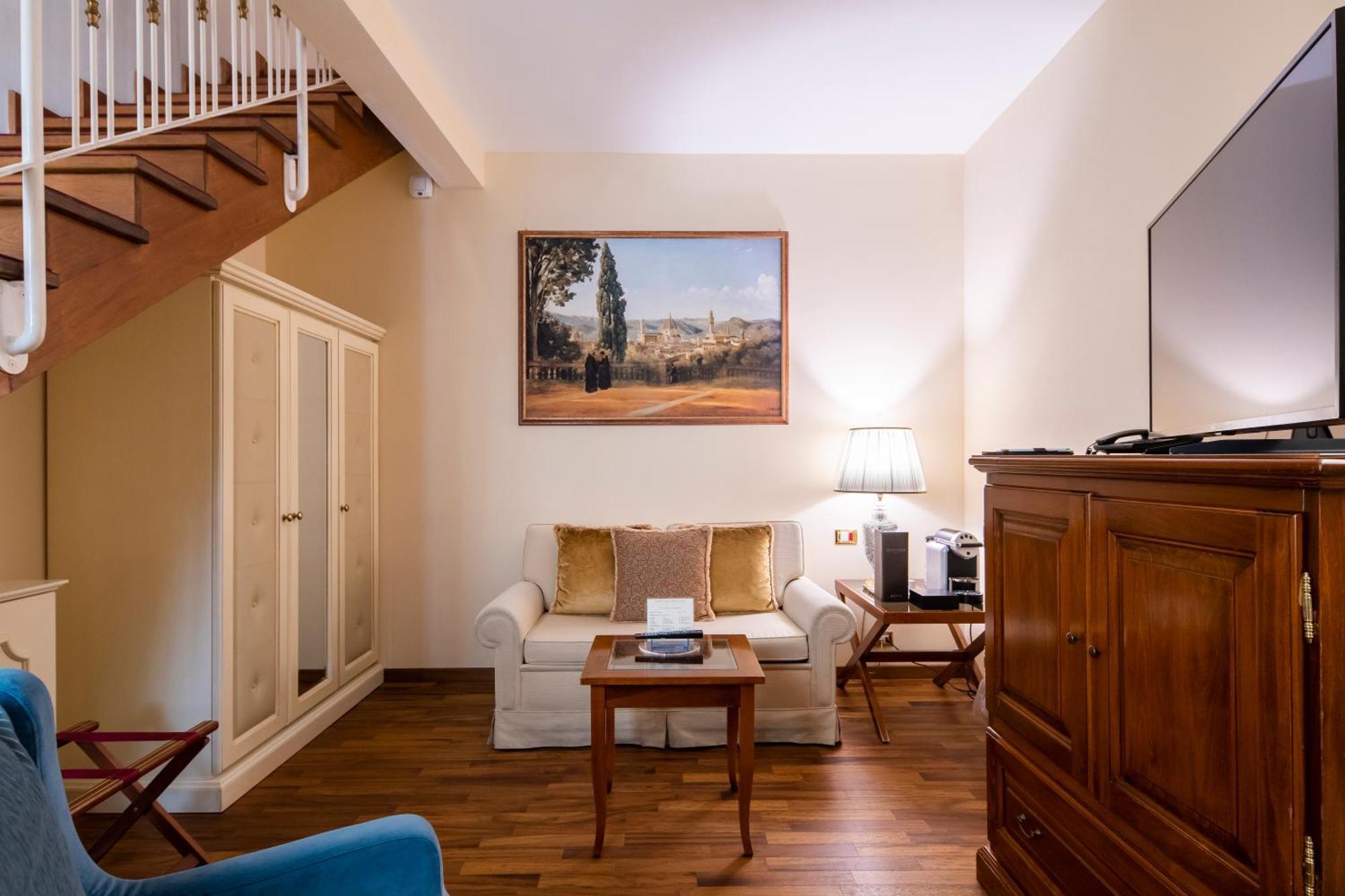 Golden Tower Hotel & Spa Firenze Kültér fotó A room at the hotel