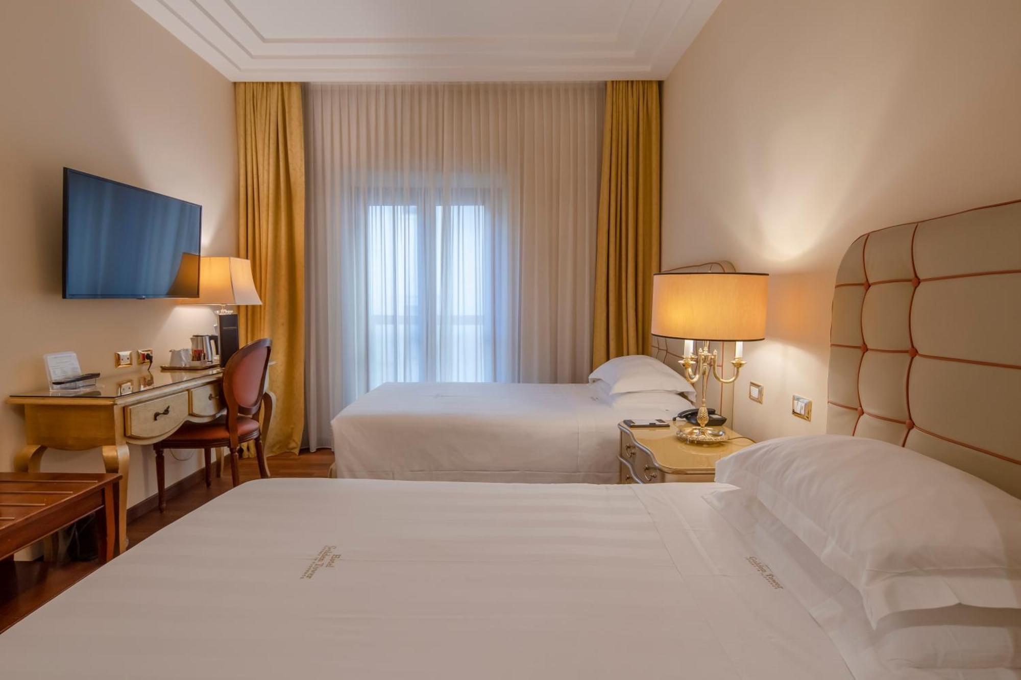 Golden Tower Hotel & Spa Firenze Kültér fotó A room at the hotel